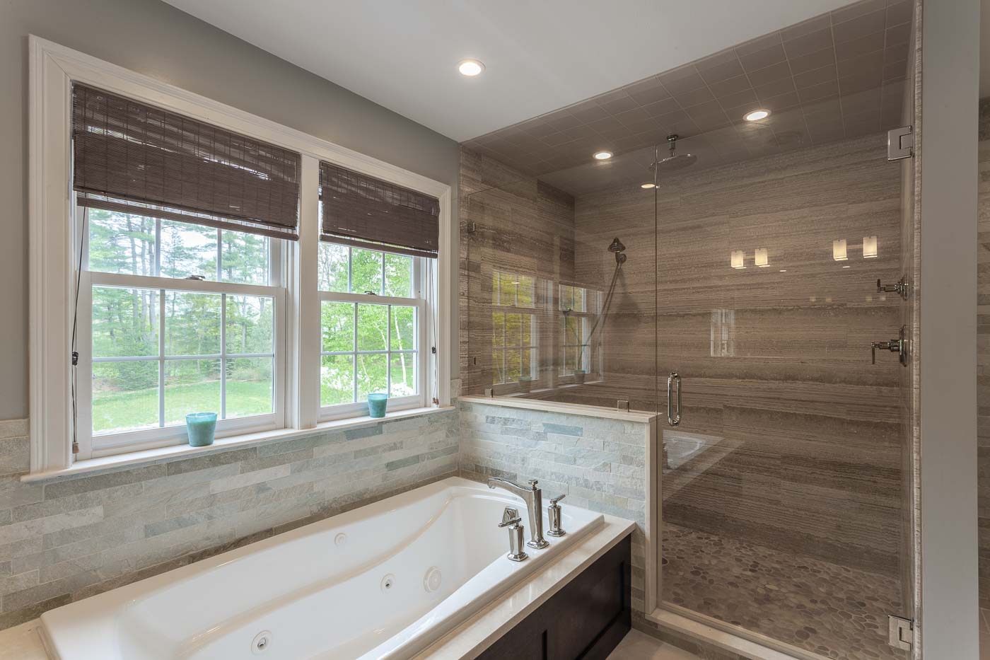 A shower and bath with a view