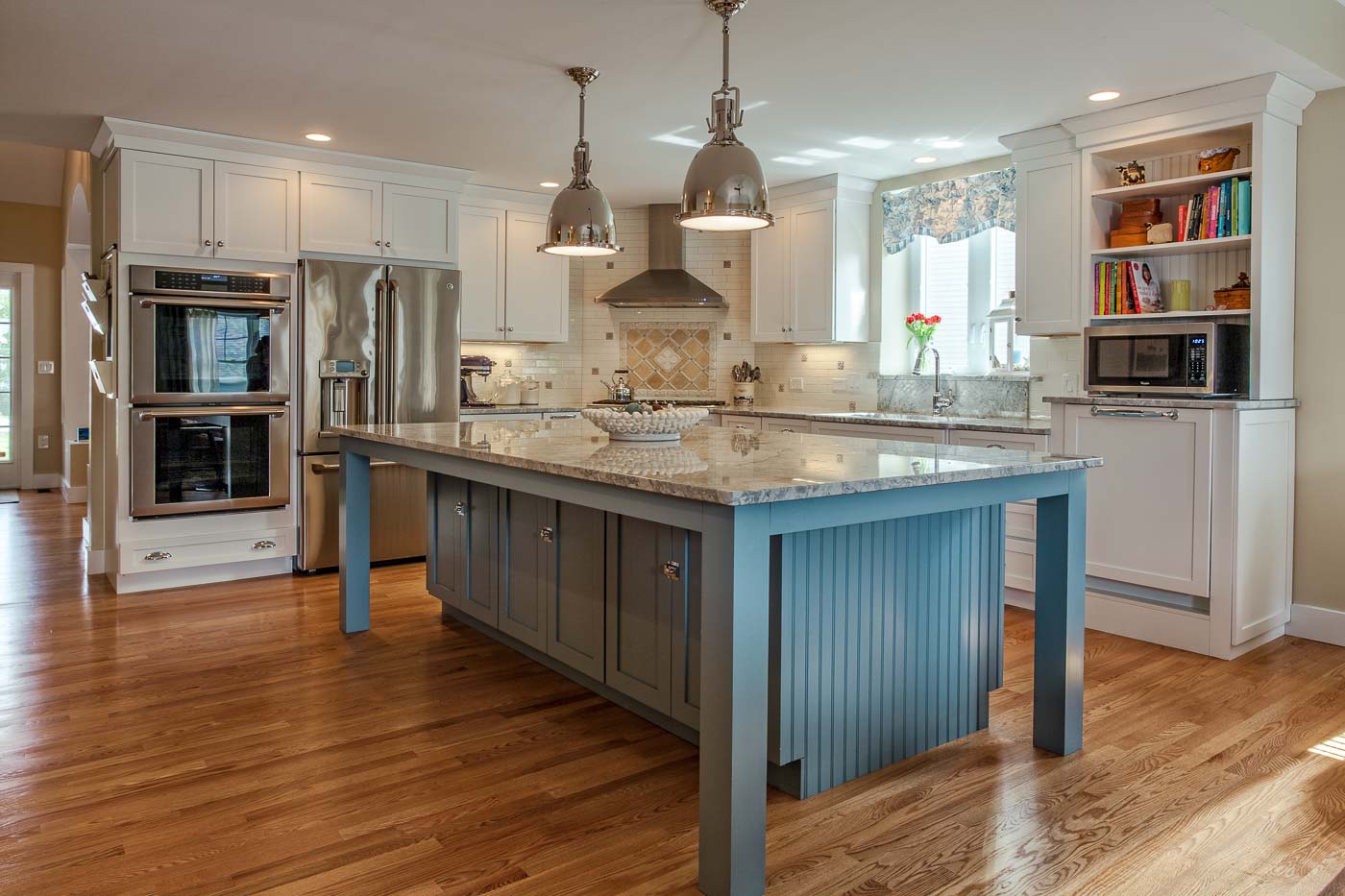 This over 55 kitchen features great accessibility and includes a raised dishwasher
